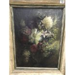 A framed still life oil on canvas with flowers by
