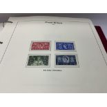 A collection of first day covers and stamps albums