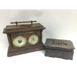 A mahogany cased clock and barometer set together