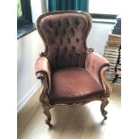 A Victorian walnut button back and draylon upholst