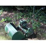 A Ransomes Marquis power assisted roller wide blade petrol engine lawn mower.