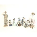 A collection of ceramic figures including Lladro,