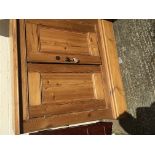 An Antique pine cupboard the rectangular top above