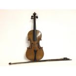 A Nicholas Amati Anno 1721 violin with bow, damage