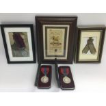 Two cased British service medals plus three frames