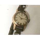 A ladies vintage MuDu 18carat gold watch with a me