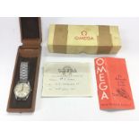 A 1950s gents Omega watch with box and paperwork.