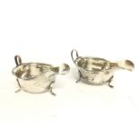 Silver hallmarked jugs, approximately 7cm tall. Po