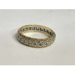 An eternity ring , size N. Postage cat A