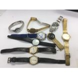 A collection of various watches. Shipping category