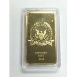A 2018 Kentucky Mint 1oz gold plated bar. Shipping