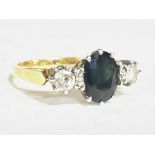 A 18ct gold diamond and black quartz ring , size M