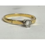 An 18ct gold ring set with a solitaire , 2.3G, siz