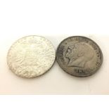 A George V 1935 crown and a silver coin , postage