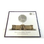 A 2015 Â£100 Buckingham palace silver coin carded.