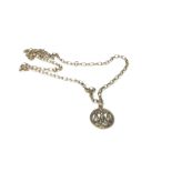 A 9ct gold necklace with a pendant attached. Appro