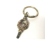 A Victorian gilt & stone set watch key, postage ca