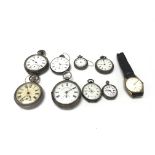 A collection of assorted pocket watches and a Accu