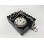 A Swiss silver cased button wind watch with attach