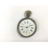 A silver pocket watch, seen working. Shipping cate