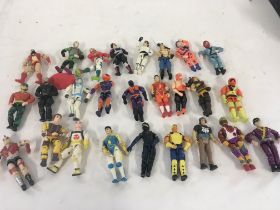 A collection in excess of 25 action figures from G