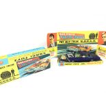 A Boxed Corgi Toys Gun Firing Thrush-Buster from the Man From U.N.C.L.E. #497.includes the repro Rin