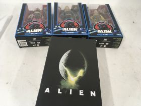 Collection of four boxed action figures from Alien