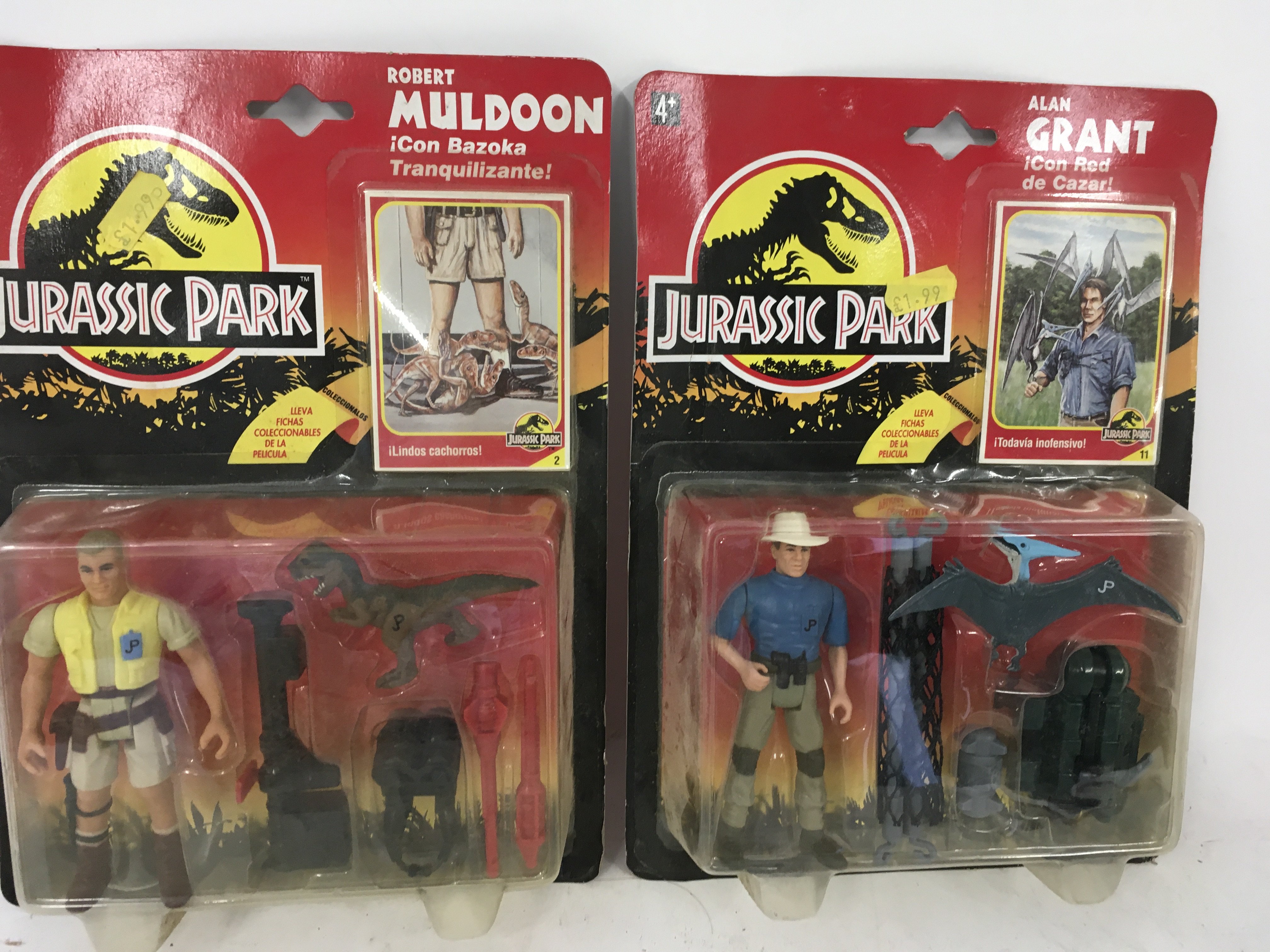 Two carded vintage Jurassic Park action figures Al