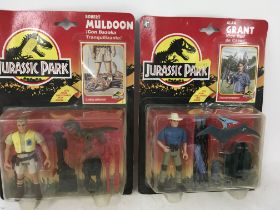 Two carded vintage Jurassic Park action figures Al