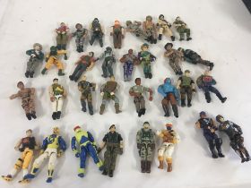A collection in excess of 30 action figure from GI