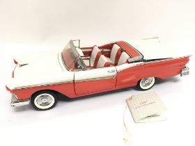 A Boxed Franklin Mint 1957 Ford Skyliner.