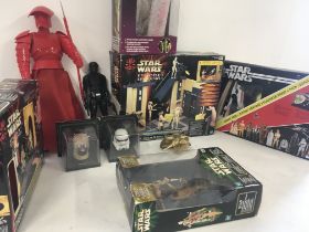 Collection of Star Wars related items including ac