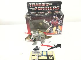 A Boxed Transformers MB Dinobot Flamethrower Slag.