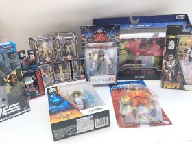 A Box Containing Various Modern Figures Including