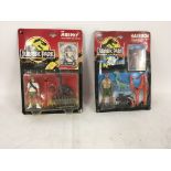 Two carded action figures from Jurassic Park..Tim