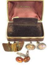 Three pairs of vintage cufflinks including silver