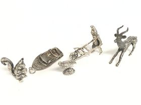 A collection of Silver miniature figurines includi