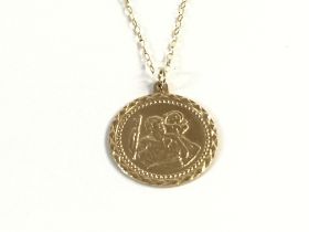 A 9ct gold pendant and chain. 3.9g Postage A