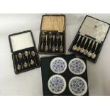 Two pairs of cased silver spoons and a set of blue and white Minton dishes one case of silver plated
