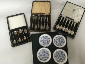 Two pairs of cased silver spoons and a set of blue and white Minton dishes one case of silver plated