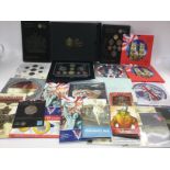 A collection of uncirculated coin sets. Shipping c