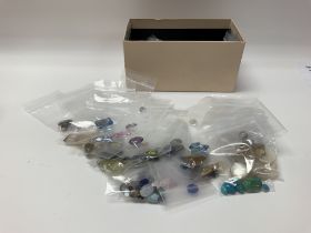 A collection of loose cut gem stones.