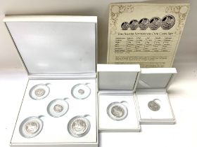 A cased Silver Sovereign 5 coin set together with