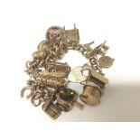 A 9carat gold charm bracelet weight 77g