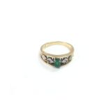 A 14k gold, emerald and diamond ring, approx 0.04c