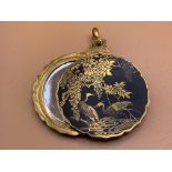 A Vintage Japanese Shakudo Damascene locket and co