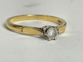 An 18ct gold ring set with a solitaire , 2.3G, siz