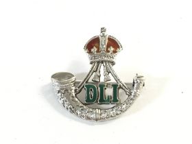 9ct white gold Durham light infantry brooch. 4.7g.