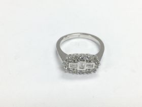 An 18ct white gold boat style RBC and baguette cut diamond ring, approx 0.50ct, approx 4.4g and