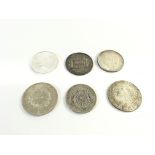 A collection of coins including a 2015 1oz silver